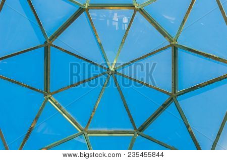 Glass Dome With A Coppery Steel Frame On A Background Of Blue Sky On The Island Of Tenerife In Spain