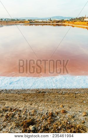 Salt Evaporation Pond View At The Flamingo Watch Reserve In Olhao, Ria Formosa Natural Park, Portuga