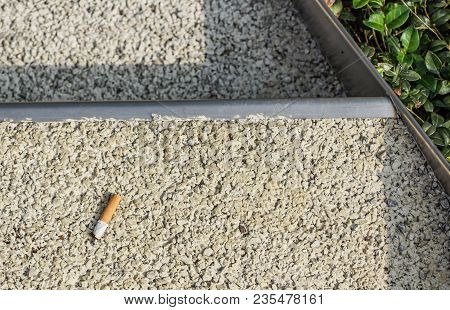 Dust And Cigarette Butt On Stairs In Apartment Block, Nanjing, China