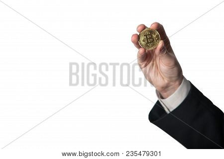 Golden Bitcoin In A Man Hand, Digitall Symbol Of A New Virtual Currency. Man Recived Money From Bitc
