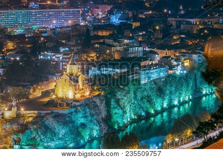 Tbilisi, Georgia - October 21, 2016: Night Evening Illuminated View Of Metekhi Church And Equestrian