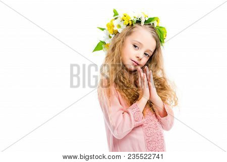 Little Child Holding Handbreadths Together And Wearing Wreath Band From Flowers Isolated On White