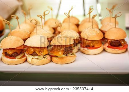 Close Up Of Mini Hamburgers At Catering Event.