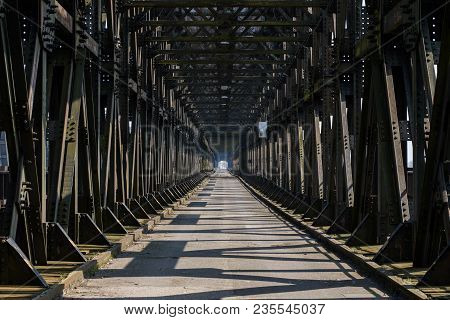 Bridge Crossing Across A Large River. Truss Bridge In The City Of Tczew In Poland.