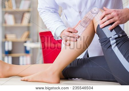 Doctor checking patients joint flexibility