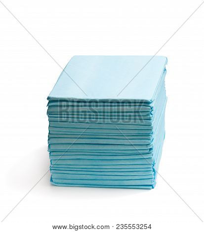 Stack  Of Disposable Bed Pads Isolated On White