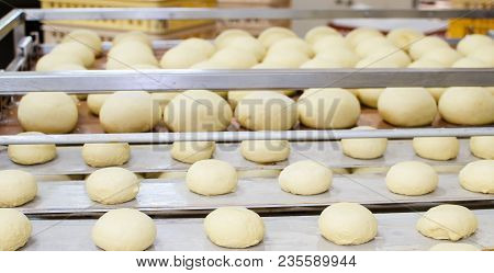 Preparation Of Donuts. Roasting In Boiling Oil. Cookng, Fried.