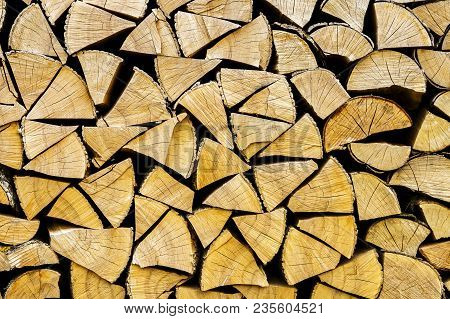 Chopped Logs For Winter Fire. Pile Of Chopped Fire Wood Prepared For Winter. Chopped Firewood Textur