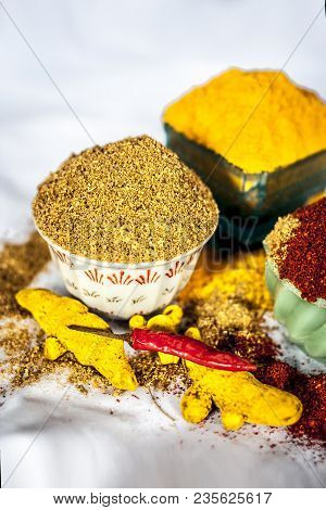 Close Up Of Three Basic Spices Of Indian Asian Food That Are Red Pepper Powder, Turmeric Powder And 