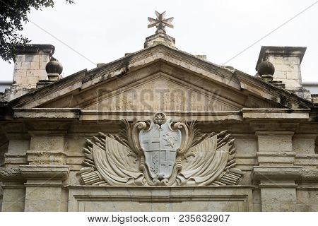 Stone Carved Coat Of Arms And Maltese Cross Above The Entrance Of The Knights Hospitallers Church, V