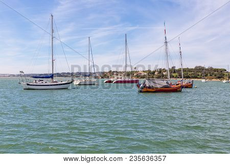 Yachts Ships In The Bay Of The River Alvor. Portugal