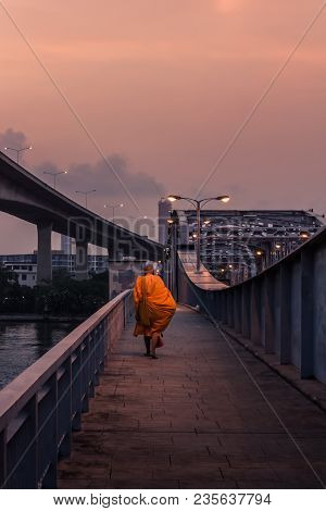 Monks Give Alms In The Morning, Walking Across The Bridge Into The City, Symbolizes The Beginning Of