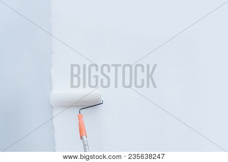 Roller Brush Painting, Worker Painting On Steel Surface Wall By The Roller Brush For Protection And 
