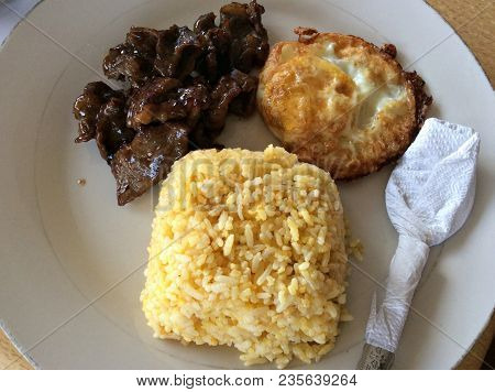 Tapsilog- Favorite Filipino Budget Meal
Tapsilog Which Is Short For Tapa (cured Beef), Sinangag (fri