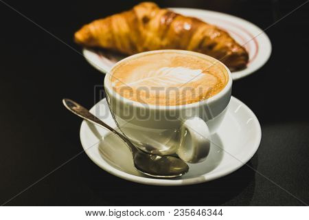 Coffee Time. Cappuccino With Croissant On Black Background