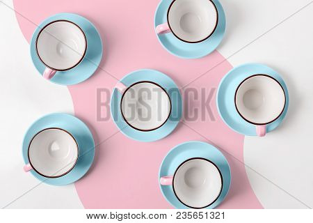 Clean Coffee Or Tea Set. Plenty Of Elegant Porcelain Light Blue Saucers And Pastel Pink Cups And At 