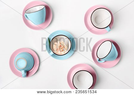 Clean Coffee Or Tea Set. Plenty Of Elegant Porcelain Light Blue Saucers And Pastel Pink Cups And At 