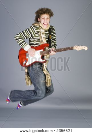 Smuk ung mand med Guitar