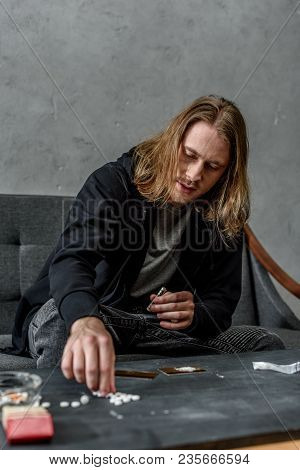Addicted Junkie Taking Mdma Pill From Table