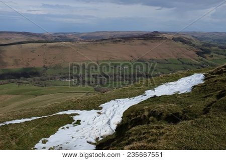 Hillsides Surrounding Mam Tor With Streak Of Snow (derbyshire, England, Uk)