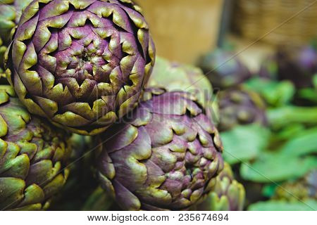 Close Up Of Fresh Vegetable Artichokes In Italian Farmer Market
