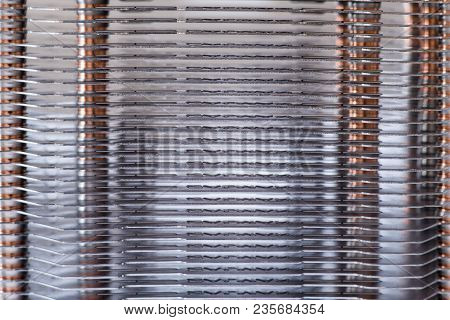 Aluminum Radiator With Copper Heat Pipe Close-up With Beautiful Bokeh Metallic