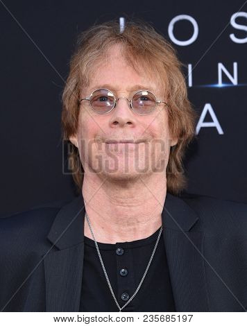LOS ANGELES - APR 09:  Bill Mumy arrives to the premiere of Netflix's 