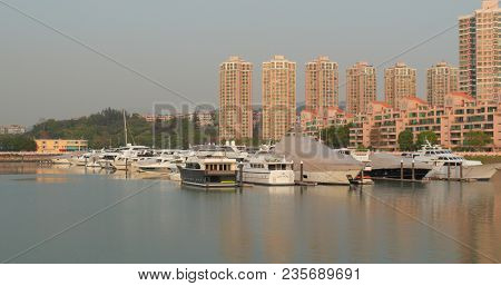 Tuen Mun, Hong Kong, 22 March 2018: Cruise in typhoon shelter in Hong Kong 