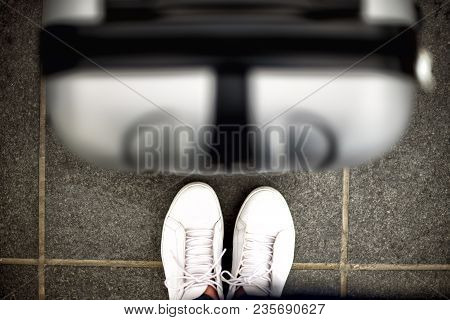 Aerial Top View With Copy Space. White Sneakers And Travel Suitcase. Travel And Vacation Concept.