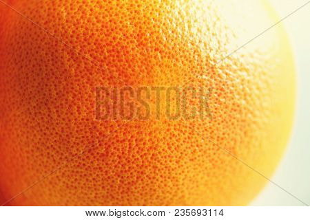 Texture Of Fresh Bright Orange Peel, Closeup, Copy Space. Macro Of Orange Fruit. Citrus Fruit Backgr