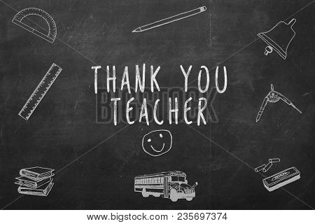 Thank You Teacher Handwritten On A Chalkboard.