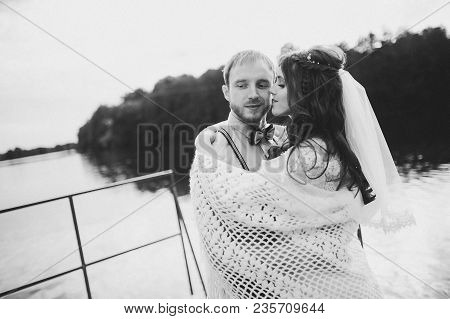 Stylish Bride And Groom Posing On The Background Of The River