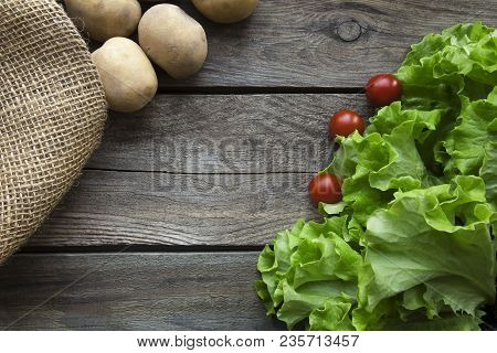 Fresh Garden Herbs On Wooden Table Board. Top View With Copy Space