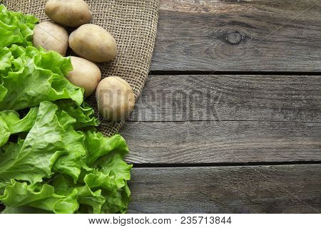 Fresh Garden Herbs On Wooden Table Board. Top View With Copy Space