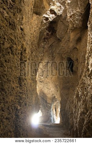 A Stunning View Inside The Cave With Rays Of Light Making Their Way Inside. Beautiful View.