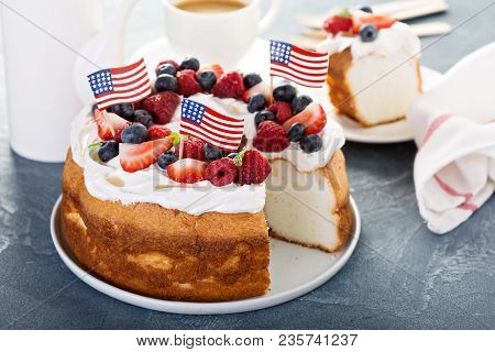 Angel Food Cake With Whipped Cream And Berries For 4th Of July