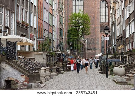 Gdansk, Poland - June 07, 2014: Unknown People Walking On The Mariacka Street In The Historical Part