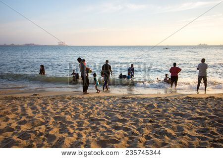 Lumut Perak, Malaysia - March 20, 2018: People Swimming At Beach Of Teluk Batik. Teluk Batik Beach I
