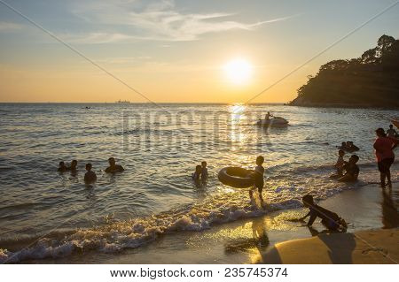 Lumut Perak, Malaysia - March 20, 2018: People Swimming At Beach Of Teluk Batik. Teluk Batik Beach I