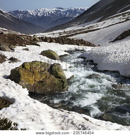 River With Snow Bridges In Mountains At Sun Day. Turkey, Kachkar Mountains, Highest Part Of Pontic M