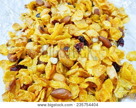 Crunchy Caramel Conflakes With Almonds, Cashew Nuts, Pumpkin Seeds And Dried Cranberries On A Try. H