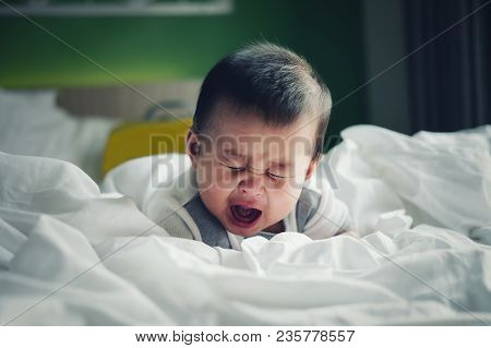Boy Crying Because Of Being In A Colic Mood.