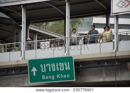 Asian Thai People Standing And Walking On Pedestrian Overpass Go To Terminal At Mrt Purple Line At P