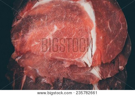 Beef Raw Meat Slides On Dish With Barbecue Sauce At Bbq. Yakiniku Grill Buffet Restaurant Japanese F