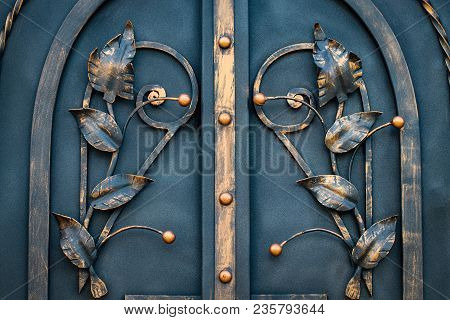 Details, Structure And Ornaments Of Forged Iron Gate. Floral Decorative Ornament, Made From Metal. V