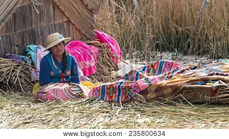 Puno, Peru - September 2017: Unidentified Women At The Floating Island Isla Flotante, Titicaca Lake,
