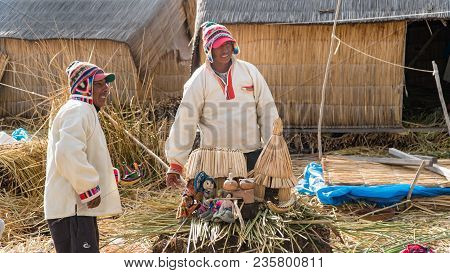 Puno, Peru - September 2017: Unidentified People At The Floating Island Isla Flotante, Titicaca Lake