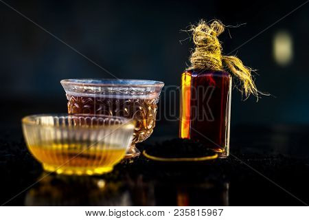 Close Up Of Ayurvedic Treatment Consisting Of Kalonji, Roman Coriander With Honey, Black Tea And Its