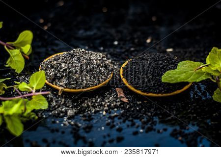 Close Up Of Kalonji, Roman Coriander, Mint Leaves, And Powder Of Kalonji With Its Extracted Oil For 