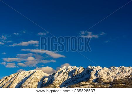 Mountains In, Styria, Austria Bad Mitterndorf View On A Snowy Terrains Surrounding Resorts
